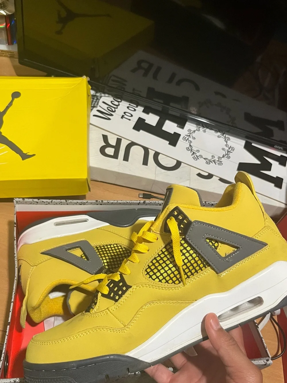 Yellow & gray Jordan Retro 4s